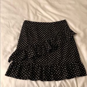 Princess Polly dark navy and white polka dot skirt